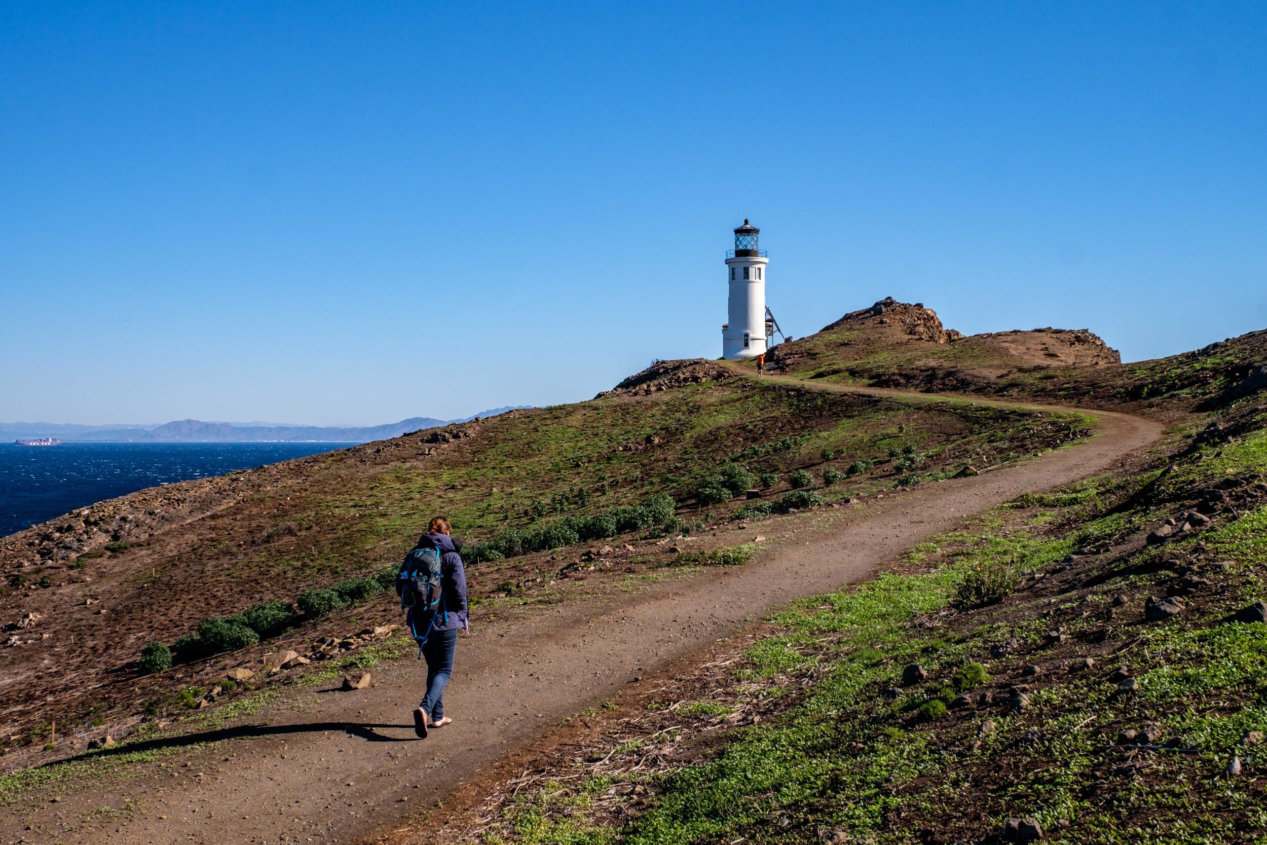 Lighthouse by a hiking trail in Channel Island. Photo Credit: Professional travel photographers Jonathan Irish and Stefanie Payne of The Greatest Road Trip.